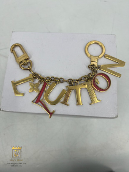 Louis Vuitton LV New Wave Bag Charm and Key Holder Gold Metal